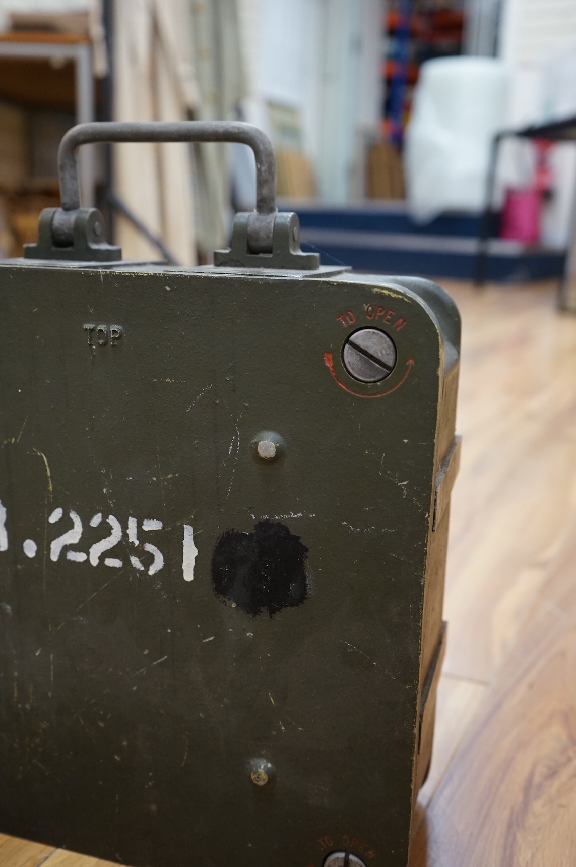 A British military Astral Smiths eight day signal clock, housed in a metal alloy case with detachable cover, 29 x 29 x 12cm